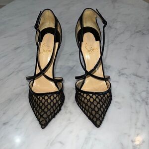 Christian Louboutin black pumps